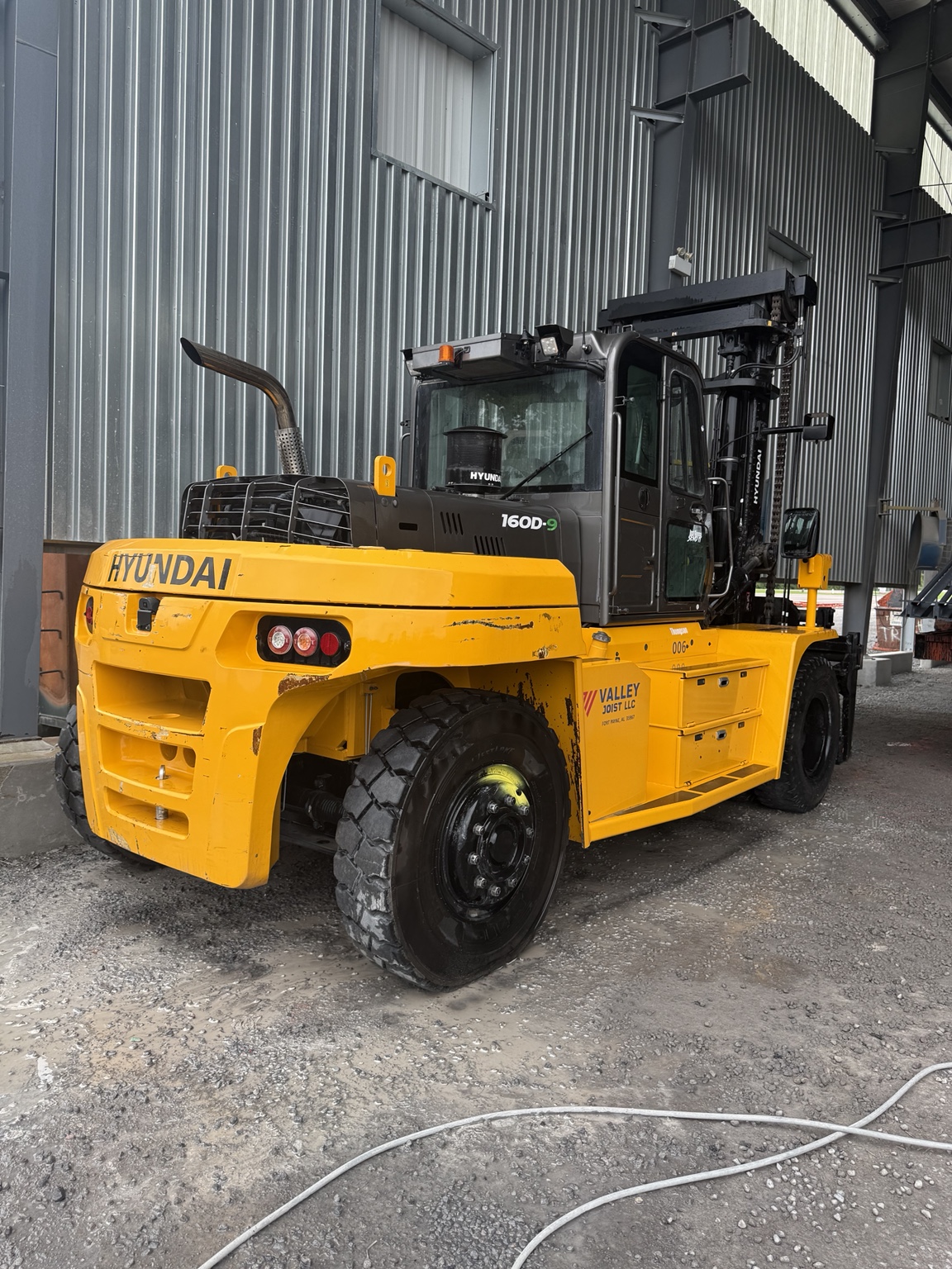 Heavy equipment cleaning by Alpha Pressure Washing LLC